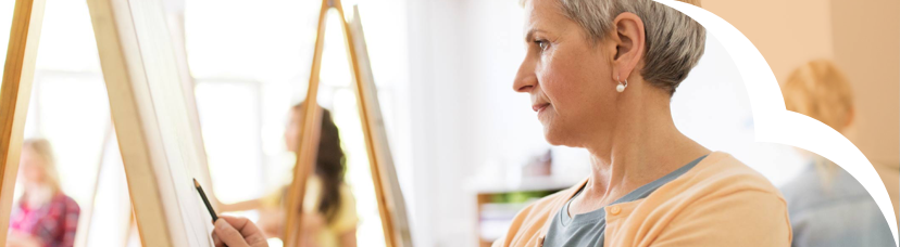 Woman sketching on canvas